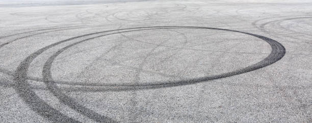 istock Car track asphalt pavement background at the circuit 1056665482