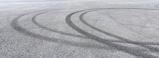 istock Car track asphalt pavement background at the circuit 1056665930