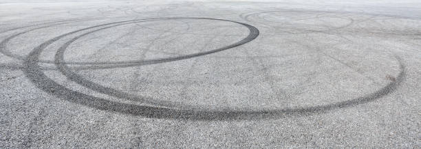 istock Car track asphalt pavement background at the circuit 1056668758