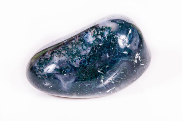 istock Macro mineral stone Agate mossy (India) on a white background 1056669172
