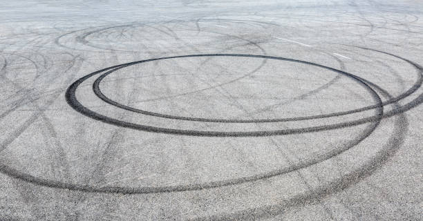 istock Car track asphalt pavement background at the circuit 1056669256