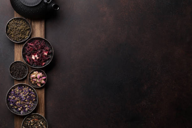 istock Various tea and teapot. Black, green and red tea 1056669536