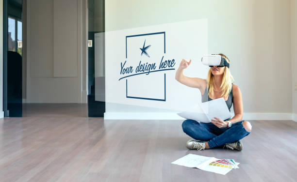 istock Woman decorating with virtual reality glasses 1056670304