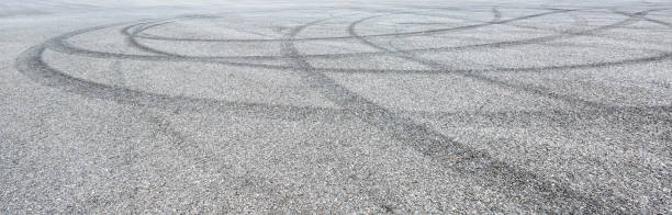 istock Car track asphalt pavement background at the circuit 1056674306