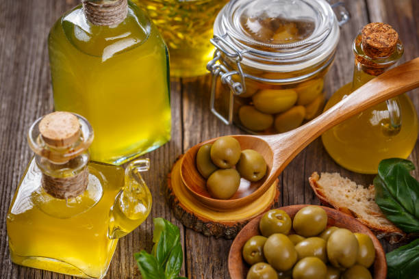 istock Olive oil and olive berries 1056674950