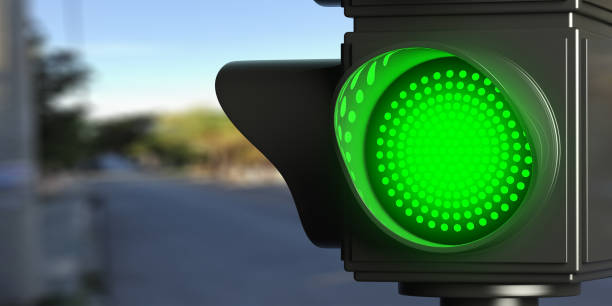 istock Green traffic lights on blur street background, copy space. 3d illustration 1056675182