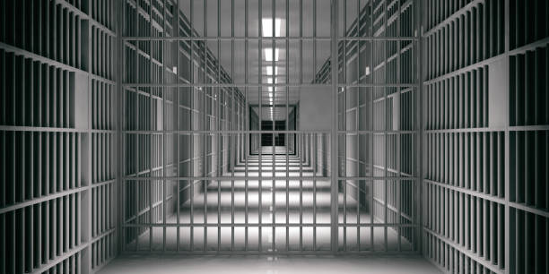 istock Prison interior. Jail cells, dark background. 3d illustration 1056675252