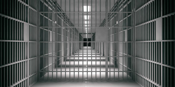 Prison interior. Jail cells, dark background. 3d illustration stock photo