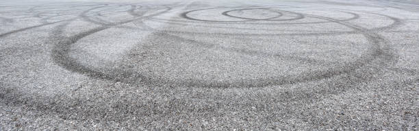 istock Car track asphalt pavement background at the circuit 1056675664