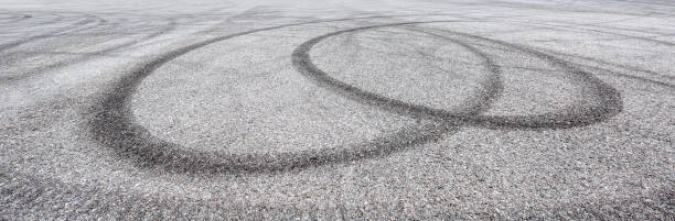 istock Car track asphalt pavement background at the circuit 1056675672