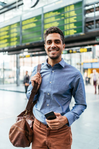 istock Latino man traveling to work by train 1056675894