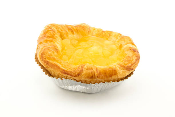 istock Apple danish pastry in aluminium foil cup on white background 1056682210