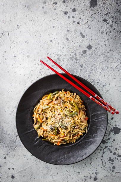 istock Plate of stir fry noodles 1056683394
