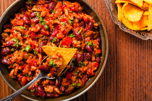 istock Mexican nachos with chili con carne 1056683790