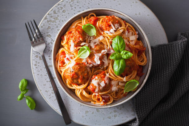 istock spaghetti with meatballs and tomato sauce, italian pasta 1056683944