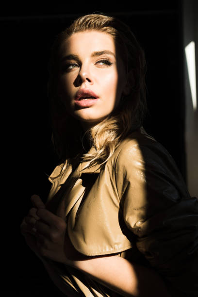 istock side view of beautiful and stylish model looking away 1056686712