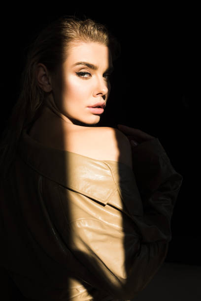 istock side view of beautiful and stylish model looking at camera 1056686758