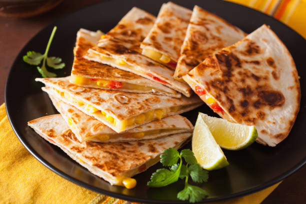 istock mexican quesadilla with tomato sweet corn cheese 1056687356