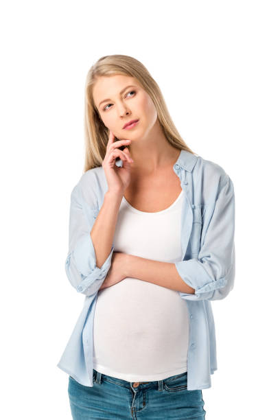 linda mulher grávida pensativa isolada no branco - human pregnancy pensive women thinking - fotografias e filmes do acervo