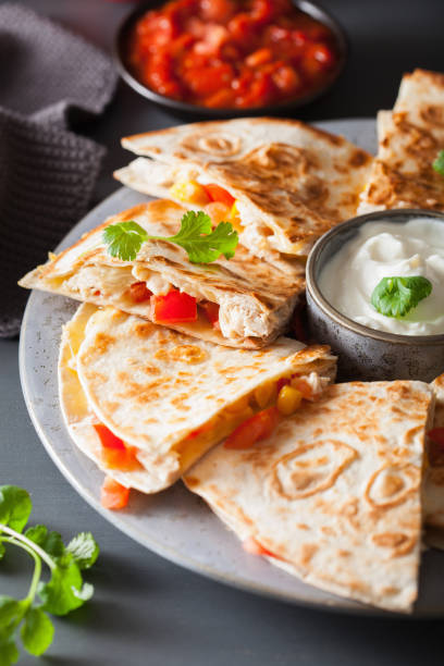 istock mexican quesadilla with chicken, tomato, sweet corn and cheese 1056689806