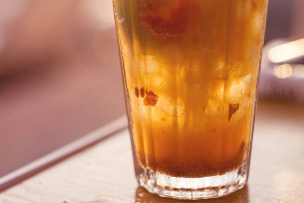 istock Iced Exotic Cocktail On Table At Sunset 1056700434