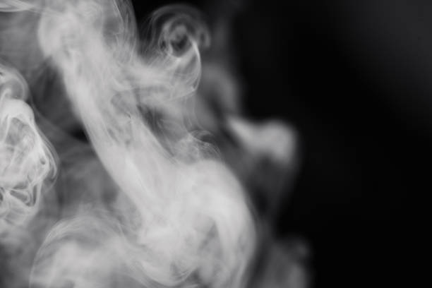 クローズ アップ黒の背景上の煙します。 - wispy smoke steam swirl ストックフォトと画像