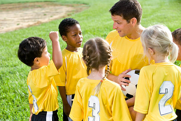 istock Coach coaching diverse young team of soccer players 105670525