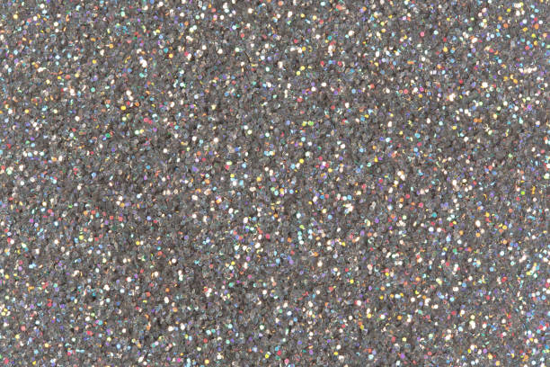 istock Silver glitter background. Low contrast photo of silver glitter. 1056709870