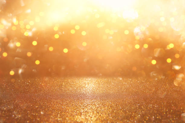 istock glitter vintage lights background. silver and gold. de-focused. 1056714750