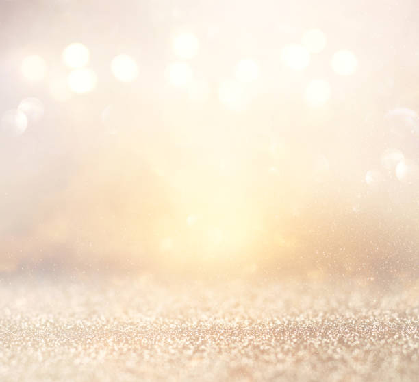 istock glitter vintage lights background. silver and gold. de-focused. 1056714758