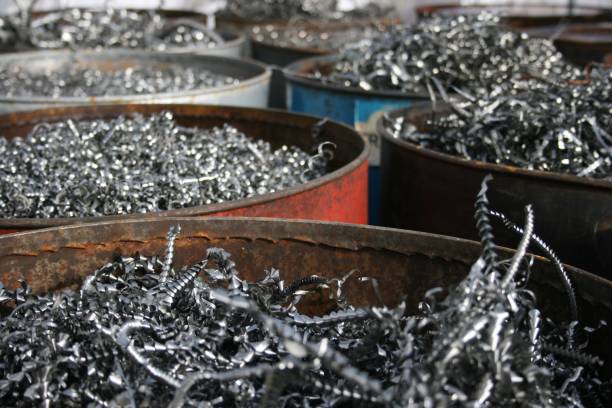An aerial drone view of a metal scrapyard.