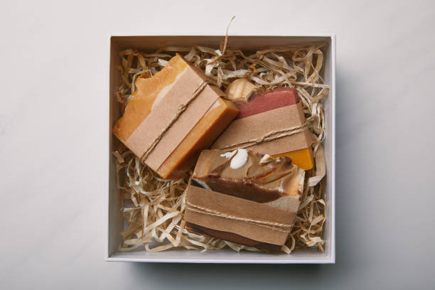 istock top view of box with soap inside on white marble tabletop 1056721634