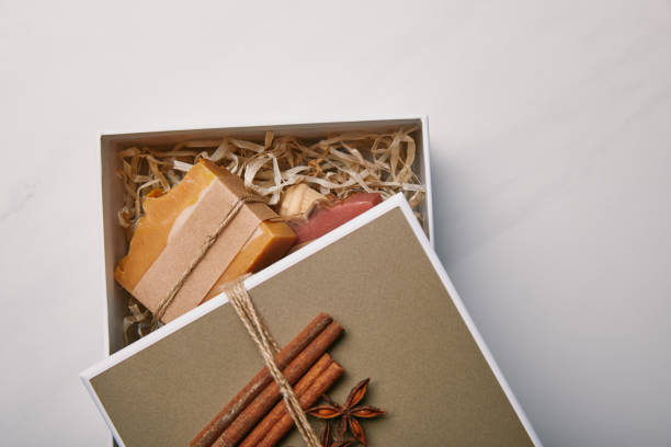 istock top view of gift box with handmade soap inside on white marble surface 1056721638