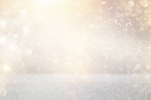 istock glitter vintage lights background. silver and gold. de-focused. 1056722108