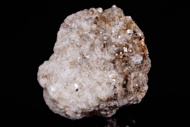 istock Macro mineral stone Albit on black background 1056722200
