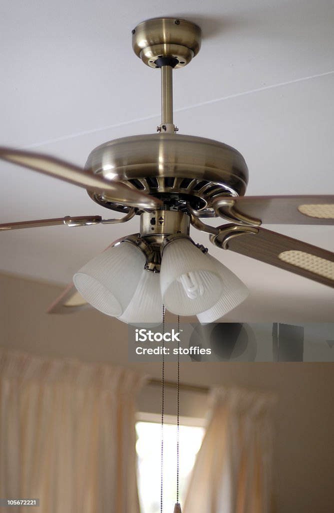 Ceiling Fan a Cropped Household Ceiling Fan. Ceiling Fan Stock Photo