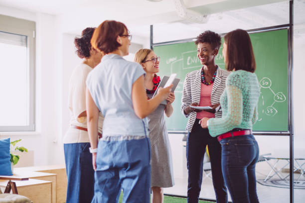 istock Agile team members brief on daily meeting 1056724942