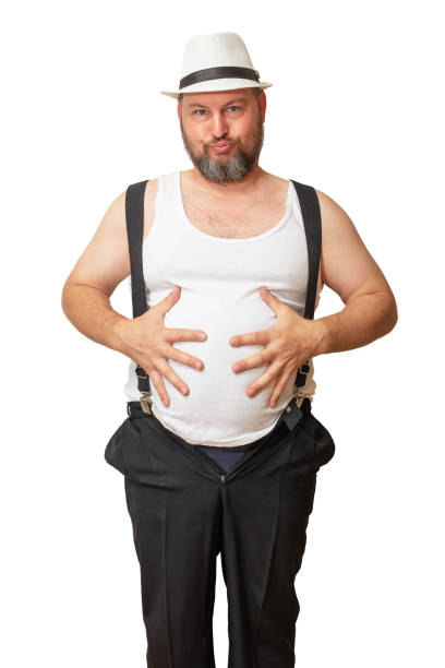 a man with a big belly shows his size with his hands. - slenderize imagens e fotografias de stock