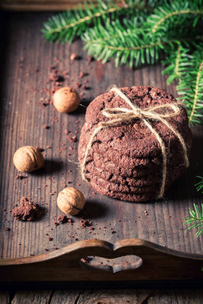 istock Traditionally chocolate cookies with nuts and spruce 1056727038