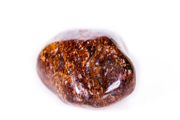 istock Macro mineral stone Bronze on white background 1056730178