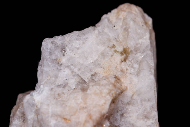istock Macro mineral stone Wollastonite on black background 1056730694