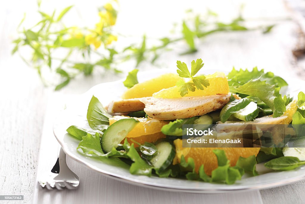 salad with chicken, orange and cucumber Chicken Meat Stock Photo