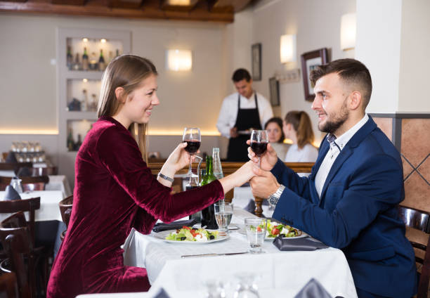 istock Couple on romantic date at restaurant 1056734258