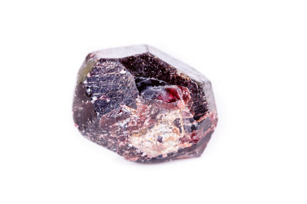 istock Macro of a mineral garnet stone on a white background 1056736136