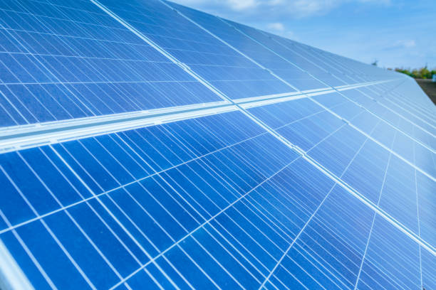 istock Solar panels, photovoltaic, alternative source environmentally friendly energy. In the backlight sunbeam light. 1056739498