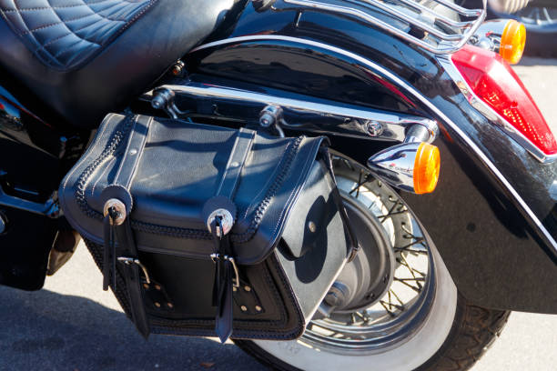 istock Leather biker bag on a motorcycle close-up. Concept travel on a motorcycle 1056739668