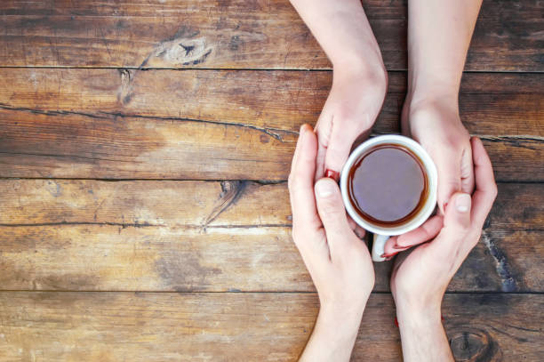istock A cup of tea in the hands. Selective focus. Drink. 1056740262