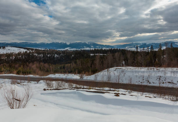 istock Evening winter cloudy day mountain ridge 1056744628