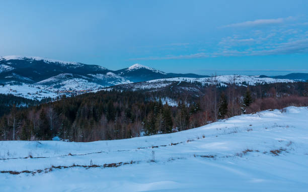 istock Evening twilight winter mountain ridge panorama 1056745398