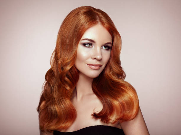 istock Redhead woman with curly hair 1056750242